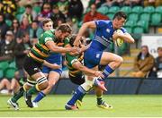 23 August 2014; Jordan Coghlan, Leinster, is tackled by Dom Waldouck and Phil Dowson, Northampton Saints. Pre-Season Friendly, Northampton Saints v Leinster, Franklins Gardens, Northampton, England. Picture credit: Ramsey Cardy / SPORTSFILE