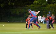 23 August 2014; Bill Coghlan, Clontarf, bats the ball from a delivery. RSA Irish Senior Cup Final, The Hills v Clontarf, Castle Avenue, Clontarf, Dublin. Picture credit: Piaras Ó Mídheach / SPORTSFILE