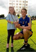 23 August 2014; Aaron Cunningham of Clare is presented with TG4/Bord Gáis Energy Man of the Match Award by Abbie Coll, age 6, from Ennis, Co. Clare. Bord Gáis Energy GAA Hurling Under 21 All-Ireland Championship, Semi-Final, Clare v Antrim, Semple Stadium, Thurles, Co. Tipperary. Picture credit: Stephen McCarthy / SPORTSFILE