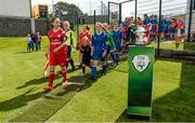 23 August 2014; Shelbourne FC captain Courtney Higgins looks across at the cup as she leads out the teams ahead of the game. FAI Umbro Women's Under 16 Cup Final, Shelbourne FC v Peamount United FC, Jackson Park, Kiltiernan, Co. Dublin. Picture credit: Barry Cregg / SPORTSFILE