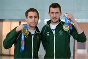 24 August 2014; Team Ireland athletes Jason Smyth, from Eglinton, Co. Derry, left, and Michael McKillop, from Newtownabbey, Co. Antrim pictured on their return at Dublin Airport from the 2014 IPC Athletics European Championships in Wales. Dublin Airport, Dublin. Picture credit: Barry Cregg / SPORTSFILE
