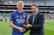 24 August 2014; Jim Dollard, Executive Director, Electric Ireland, proud sponsor of the GAA All-Ireland Minor Championships, presents Killian Spillane, from Kerry, with the player of the match award for his outstanding performance in the Electric Ireland GAA Football All Ireland Minor Championship Semi-Final, Kerry v Mayo, Croke Park, Dublin. Picture credit: Brendan Moran / SPORTSFILE