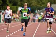 24 August 2014; James Harrington, Kenmare, Co.Kerry, centre, with Darragh Buckley, Mallow South, Co.Cork, left, and Shane Coyle, Moylough/Mountbellew, Co.Galway, in action during the semi Final of the Boys U.14 100 metres. HSE Community Games August Festival 2014, Athlone Institute of Technology, Athlone, Co. Westmeath.  Picture credit: David Maher / SPORTSFILE