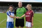 23 August 2014; Team captains Sinead Burke, right, Galway, and Christina Reilly, Monaghan, shake hands in the company of referee Keith Delahunty ahead of the game. TG4 All-Ireland Ladies Football Senior Championship, Quarter-Final, Galway v Monaghan, St Brendan's Park, Birr, Co. Offaly. Picture credit: Brendan Moran / SPORTSFILE