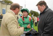 24 August 2014; Jockey Shane Foley, who rode Raydara to win the Debutante Stakes, speaking with trainer Michael Halford, left, and Pat Downes, racing manager H H Aga Khan. Curragh Racecourse, The Curragh, Co. Kildare. Picture credit: Barry Cregg / SPORTSFILE