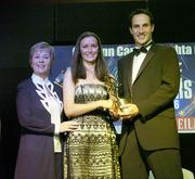 11 November 2006; Tipperary's Suzanna Kelly receives her All-Star award from Tadhg Kennelly, footballer with the Sydney Swans, in the company of Liz Howard, President, Cumann Camogaiochta na nGael, speaking at the 2006 Camogie All-Star Awards. Citywest Hotel, Dublin. Picture credit: Brendan Moran / SPORTSFILE
