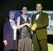 11 November 2006; Dublin's Louise O'Hara receives her All-Star award from Tadhg Kennelly, footballer with the Sydney Swans, in the company of Liz Howard, President, Cumann Camogaiochta na nGael, speaking at the 2006 Camogie All-Star Awards. Citywest Hotel, Dublin. Picture credit: Brendan Moran / SPORTSFILE