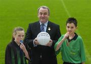 14 November 2006; President of the GAA, Mr. Nickey Brennan and Allianz Cumann na mBunscoil young whislers Dean Fitzpatrick and Nicola Carroll attend the launch of the new refereeing initiative - the National Referee Recruitment Campaign. Croke Park, Dublin. Picture credit: Damien Eagers / SPORTSFILE