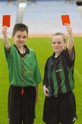 14 November 2006; Allianz Cumann na mBunscoil young whislers Dean Fitzpatrick and Nicola Carroll issue the red card as they attend the launch of the new refereeing initiative - the National Referee Recruitment Campaign. Croke Park, Dublin. Picture credit: Damien Eagers / SPORTSFILE