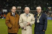 15 November 2006; A presentation is made to Ronnie Nolan, centre, by David Blood, right, President FAI, and Padraig Corkery, Head of Sponsorship, eircom, during half-time of the game. Euro 2008 Championship Qualifier, Republic of Ireland v San Marino, Lansdowne Road, Dublin. Picture credit: David Maher / SPORTSFILE