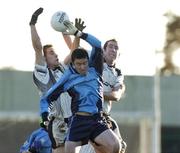 18 November 2006; Kevin Connell, Tyrrellspass, in action against John Mahon, left, and Eamon Mahon, Arles-Killeen. AIB Leinster Club Football Championship Quarter-Final Replay, Arles-Killeen v Tyrrellspass, O'Moore Park, Portlaoise, Co. Laois. Picture credit: Matt Browne / SPORTSFILE