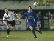 22 November 2006; James Chambers, Waterford United, in action against Robbie Dunne, Dundalk. eircom League Premier Division / First Division Playoff 1st Leg, Dundalk v Waterford United, Oriel Park, Dundalk. Picture credit: David Maher / SPORTSFILE