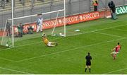 24 August 2014; Mayo's Cillian O'Connor puts the ball past Kerry's Brian Kelly from the penalty spot to score his side's only goal of the game. GAA Football All-Ireland Senior Championship, Semi-Final, Kerry v Mayo, Croke Park, Dublin. Picture credit: Pat Murphy / SPORTSFILE