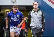 24 August 2014; James O'Donoghue, Kerry, runs past injured team-mate Colm Cooper as the Kerry team enter come onto the pitch before the game. GAA Football All-Ireland Senior Championship, Semi-Final, Kerry v Mayo, Croke Park, Dublin. Picture credit: Brendan Moran / SPORTSFILE