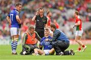 24 August 2014; James O'Donoghue, Kerry, is treated for an injury during the first half. GAA Football All-Ireland Senior Championship, Semi-Final, Kerry v Mayo, Croke Park, Dublin. Picture credit: Stephen McCarthy / SPORTSFILE