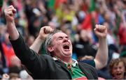 24 August 2014; A Mayo supporter celebrates after Cillian O'Connor's goal in the second half. GAA Football All-Ireland Senior Championship, Semi-Final, Kerry v Mayo, Croke Park, Dublin. Picture credit: Ramsey Cardy / SPORTSFILE