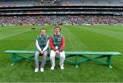 24 August 2014; Representatives from Down Syndrome Ireland and Irish Autism Action, two of the GAA’s partner charities for 2014, provide a guard of honour as the teams enter the pitch as part of the GAA ‘Inclusion Day’. Shane Byrne and David O'Brien who helped out attending to the pitch take a rest on the team bench. Electric Ireland GAA Football All Ireland Senior Championship Semi-Final, Kerry v Mayo, Croke Park, Dublin. Picture credit: Ray McManus / SPORTSFILE