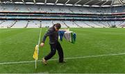 24 August 2014; Croke Park groundsman Shane Burke collects the sideline flags after the game. GAA Football All-Ireland Senior Championship, Semi-Final, Kerry v Mayo, Croke Park, Dublin. Picture credit: Ray McManus / SPORTSFILE