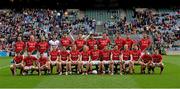 24 August 2014; The Mayo goalkeeper Robert Hennelly  calls on his team mates, who had sat for the traditional team picture, to wait for his arrival. GAA Football All-Ireland Senior Championship, Semi-Final, Kerry v Mayo, Croke Park, Dublin. Picture credit: Ray McManus / SPORTSFILE