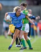 23 August 2014; Rachel Ruddy, Dublin, attempts to stay in play as she is put under pressure by Patrice Dennehy, Kerry. TG4 All-Ireland Ladies Football Senior Championship, Quarter-Final, Dublin v Kerry, St Brendan's Park, Birr, Co. Offaly. Picture credit: Brendan Moran / SPORTSFILE
