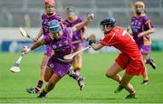 23 August 2014; Katrina Parrock, Wexford, in action against Pamela Mackey, Cork. Liberty Insurance All-Ireland Senior Camogie Championship Semi-Final, Cork v Wexford, Semple Stadium, Thurles, Co. Tipperary. Picture credit: Diarmuid Greene / SPORTSFILE