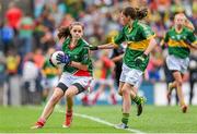 24 August 2014; Louise McGeer, Grangecon N.S, Wicklow representing Mayo, in action against Aoibhinn Donnelly, Clarecastle N.S, Calrecastle, Clare, representing Kerry. INTO/RESPECT Exhibition GoGames, Croke Park, Dublin. Picture credit: Stephen McCarthy / SPORTSFILE