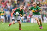 24 August 2014; Louise McGeer, Grangecon N.S, Wicklow, representing Mayo, in action against Anna Clifford, Fossa N.S, Killarney, Kerry, representing Kerry. INTO/RESPECT Exhibition GoGames, Croke Park, Dublin. Picture credit: Stephen McCarthy / SPORTSFILE