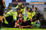25 August 2014; Daniel Byrne, Bohemians, is stretchered off by medical staff. FAI Ford Cup, 3rd Round Reply, Cork City v Bohemians. Dalymount Park, Dublin. Picture credit: David Maher / SPORTSFILE