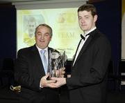 18 November 2006; Malachy Molloy, Antrim, is presented with his award by GAA President Nickey Brennan at the 2006 Christy Ring Cup &quot;Champion 15&quot; Awards. Croke Park, Dublin. Picture credit: Ray McManus / SPORTSFILE