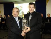 18 November 2006; Fergus McMahon, London, is presented with his award by GAA President Nickey Brennan at the 2006 Christy Ring Cup &quot;Champion 15&quot; Awards. Croke Park, Dublin. Picture credit: Ray McManus / SPORTSFILE