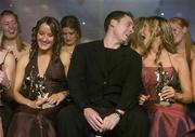 18 November 2006; Kerry All-Star award winner Sarah O'Connor, right, reacts to lyrics sung by Darryl from the Celtic Tenors, watched by, from left, Rena Buckley, Cork and Tracey Lawlor, Laois, during the 2006 TG4 / O'Neills Ladies Gaelic Football All-Star Awards. Citywest Hotel, Dublin. Picture credit: Brendan Moran / SPORTSFILE