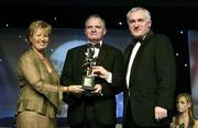 18 November 2006; Hall of Fame award winner Bill Daly is presented with his award by Geraldine Giles, President, Cumann Peil Gael na mBan and An Taoiseach Bertie Ahern, TD, at the 2006 TG4 / O'Neills Ladies Gaelic Football All-Star Awards. Citywest Hotel, Dublin. Picture credit: Brendan Moran / SPORTSFILE