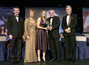18 November 2006; Bronagh O'Donnell, Armagh, receives her All-Star award from An Taoiseach Bertie Ahern, TD, in the company of, from left, Pol O Gallchoir, Ceannsai, TG4, Geraldine Giles, President, Cumann Peil Gael na mBan, and Tony Towell, Managing Director O'Neills, at the 2006 TG4 / O'Neills Ladies Gaelic Football All-Star Awards. Citywest Hotel, Dublin. Picture credit: Brendan Moran / SPORTSFILE