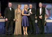 18 November 2006; Nollaig Cleary, Cork, receives her All-Star award from An Taoiseach Bertie Ahern, TD, in the company of, from left, Pol O Gallchoir, Ceannsai, TG4, Geraldine Giles, President, Cumann Peil Gael na mBan, and Tony Towell, Managing Director O'Neills, at the 2006 TG4 / O'Neills Ladies Gaelic Football All-Star Awards. Citywest Hotel, Dublin. Picture credit: Brendan Moran / SPORTSFILE
