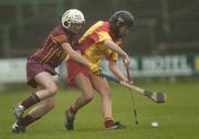 19 November 2006; Erinne Dunne, Harps, in action against Roisin Murray, Keady. All-Ireland Junior Camogie Championship Final, Harps v Keady, O'Moore Park, Portlaoise, Co. Laois. Picture credit: Brian Lawless / SPORTSFILE