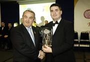 18 November 2006; Mark McEntee, Cavan, is presented with his award by GAA President Nickey Brennan at the 2006 Nicky Rackard Cups &quot;Champion 15&quot; Awards. Croke Park, Dublin. Picture credit: Ray McManus / SPORTSFILE