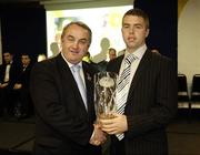 18 November 2006; Paul McCormack, Armagh, is presented with his award by GAA President Nickey Brennan at the 2006 Nicky Rackard Cups &quot;Champion 15&quot; Awards. Croke Park, Dublin. Picture credit: Ray McManus / SPORTSFILE