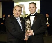 18 November 2006; Barry Winders, Tyrone, is presented with his award by GAA President Nickey Brennan at the 2006 Nicky Rackard Cups &quot;Champion 15&quot; Awards. Croke Park, Dublin. Picture credit: Ray McManus / SPORTSFILE