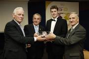 18 November 2006; Malachy Molloy, Antrim, is presented with his 'Fair Play' award by GAA President Nickey Brennan, accompanied by 'Legends' winners Jimmy Smyth, Clare, left, and Donie Nealon, Tipperary, right, at the 2006 Christy Ring / Nicky Rackard Cups &quot;Champion 15&quot; Awards. Croke Park, Dublin. Picture credit: Ray McManus / SPORTSFILE
