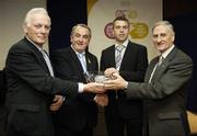 18 November 2006; Paul McCormack, Armagh, is presented with his 'Fair Play' award by GAA President Nickey Brennan, accompanied by 'Legends' winners Jimmy Smyth, Clare, left, and Donie Nealon, Tipperary, right, at the 2006 Christy Ring / Nicky Rackard Cups &quot;Champion 15&quot; Awards. Croke Park, Dublin. Picture credit: Ray McManus / SPORTSFILE