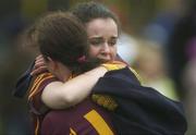 19 November 2006; Keady team-mates Danielle McBirney, left, and captain Michelle Murray console each other after the match. All-Ireland Junior Camogie Championship Final, Harps v Keady, O'Moore Park, Portlaoise, Co. Laois. Picture credit: Brian Lawless / SPORTSFILE