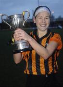 19 November 2006; St Lachtain's captain Margaret McCarthy lifts the Bill Carroll cup after the match. All-Ireland Senior Camogie Club Championship Final, St Lachtain's v O'Donovan Rossa, O'Moore Park, Portlaoise, Co. Laois. Picture credit: Brian Lawless / SPORTSFILE