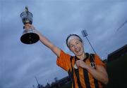 19 November 2006; St Lachtain's captain Margaret McCarthy celebrates with the Bill Carroll cup after the match. All-Ireland Senior Camogie Club Championship Final, St Lachtain's v O'Donovan Rossa, O'Moore Park, Portlaoise, Co. Laois. Picture credit: Brian Lawless / SPORTSFILE
