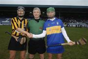 19 November 2006; St Lachtain's captain Margaret McCarthy shakes hands with O'Donovan Rossa captain Jane Adams in the company of referee Cathal Egan. All-Ireland Senior Camogie Club Championship Final, St Lachtain's v O'Donovan Rossa, O'Moore Park, Portlaoise, Co. Laois. Picture credit: Brian Lawless / SPORTSFILE