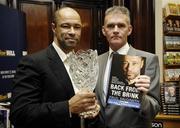 20 November 2006; Pictured at the announcement that 'Back from the Brink, the Paul McGrath autobiography, is the inaugrual winner of the William Hill Sports Book of the Year are;  Paul McGrath and  Irish Independent journalist Vincent Hogan, right. The award was presented in Easons Bookstore, Dawson Street, Dublin. Picture credit: Ray McManus / SPORTSFILE