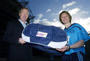 21 November 2006; Declan Moran, Director of Marketing and Business Development, Vhi healthcare, presents a kit bag to Deirdre Boylan, Captain of  Eadestown, Co. Kildare, pictured at the Vhi Healthcare All-Ireland Ladies Club Final Captains Day. Croke Park, Dublin. Picture credit: David Maher / SPORTSFILE