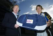 21 November 2006; Declan Moran, Director of Marketing and Business Development, Vhi healthcare, presents a kit bag to Katie Joyce, captain of Naomh Mearnog, Co. Dublin, pictured at the Vhi Healthcare All-Ireland Ladies Club Final Captains Day. Croke Park, Dublin. Picture credit: David Maher / SPORTSFILE