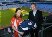 21 November 2006; Declan Moran, Director of Marketing and Business Development, Vhi healthcare, presents a kit bag to Ciara Walsh, captain of Inch, Co. Cork, pictured at the Vhi Healthcare All-Ireland Ladies Club Final Captains Day. Croke Park, Dublin. Picture credit: David Maher / SPORTSFILE