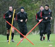23 November 2006; Darren Kelly, Kevin Deery, 0ark 0cGlynn and Peter Hutton in action during Derry City squad training in advance of the FAI Carlsberg Senior Challenge Cup Final which will take place in Lansdowne Road on December 3. Prehane, Derry. Picture credit: Oliver McVeigh / SPORTSFILE