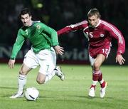 11 October 2006; Keith Gillespie, Northern Ireland, in action against Genadijs Solonicins, Latvia. Euro 2008 Championship Qualifier, Northern Ireland v Latvia, Windsor Park, Belfast. Picture credit: Oliver McVeigh / SPORTSFILE